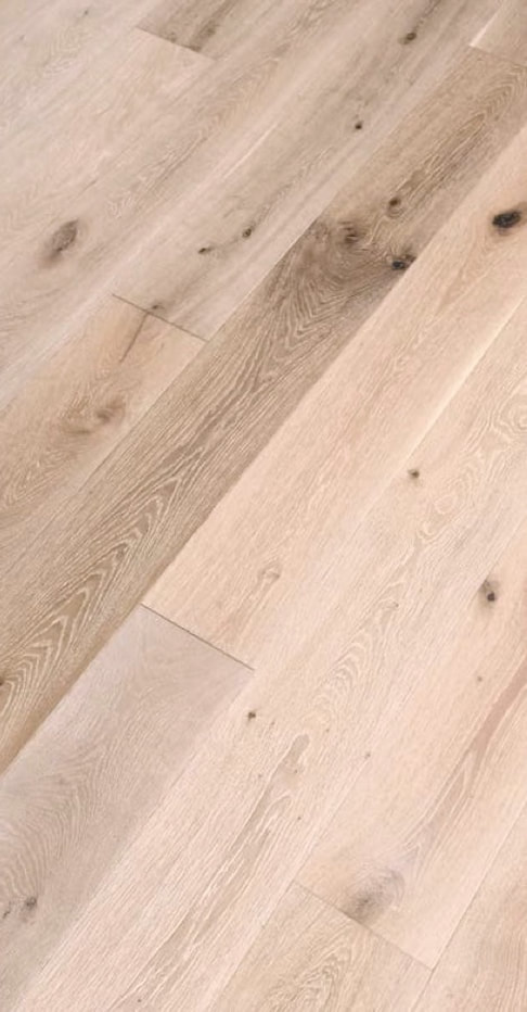 Photo: Close up of character grade engineered French Oak flooring.